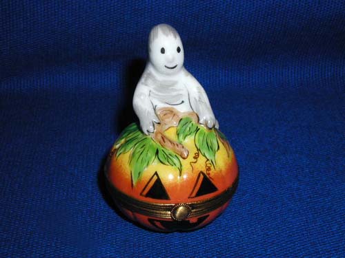 BABY GHOST ON PUMPKIN